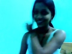 Skinny dark skin Indian college girl exposed on cam