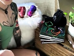 Masturbating busty blonde teen on couch with big toys