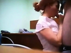 Hidden cam catches redhead in quick office fuck