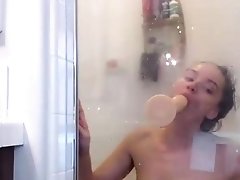 CamSoda - Pornstar rides dildo in shower before sucking it