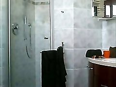 Petite young wife in the bathroom caught on hidden cam