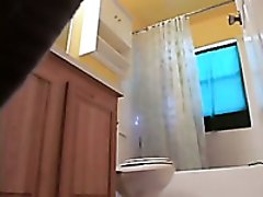 Hidden camera in the bathroom catches my flatmate shaving her pussy