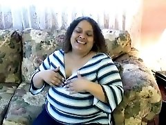BBW Latina MILF with saggy tits and huge belly poses for the camera