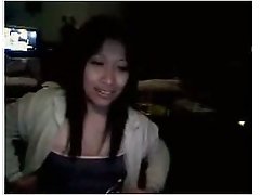 Beautiful Asian babe is smoking and flashing her privates on msn