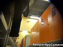 This woman doesn't suspect that there is a spy camera in the locker room