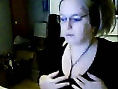 Slutty webcam blonde wearing glasses plays with her flabby tits