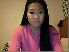 Asian slut masturbates on webcam