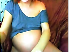 Busty pregnant whore on webcam