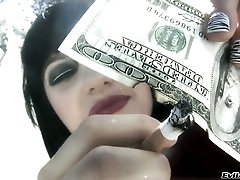 Bitchy raven haired slut with ugly make up presents nasty solo on camera