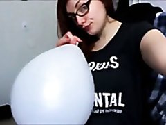 Rubbing my cocohie against a balloon in front of a webcam