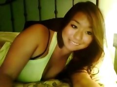 Asian webcam hussy enjoys fingering her shaved pussy