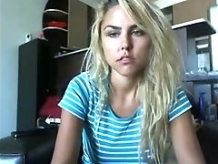 Charming amateur blonde flashes her boobies for the webcam