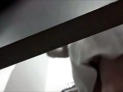 Nerdy brunette bitch changes her clothes on hidden cam