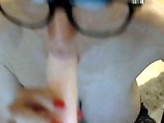 Amazingly beautiful webcam model in glasses knows how to put on a show