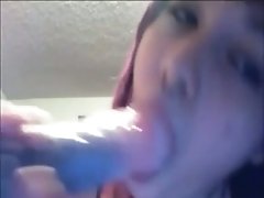 Emo teen practicing her blowjob skills on a dildo