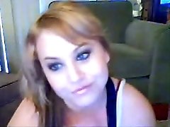 Blue eyed blonde BBW cutie smokes while showing off her stout tits